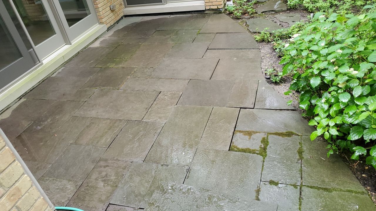 Bluestone patio cleaning by Northern Power Washing LLC.
