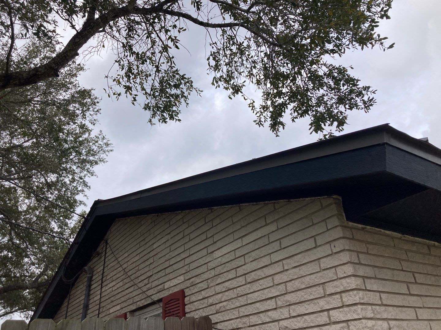 Beeville Backporch sittin' by Bayfront Roofing and Construction