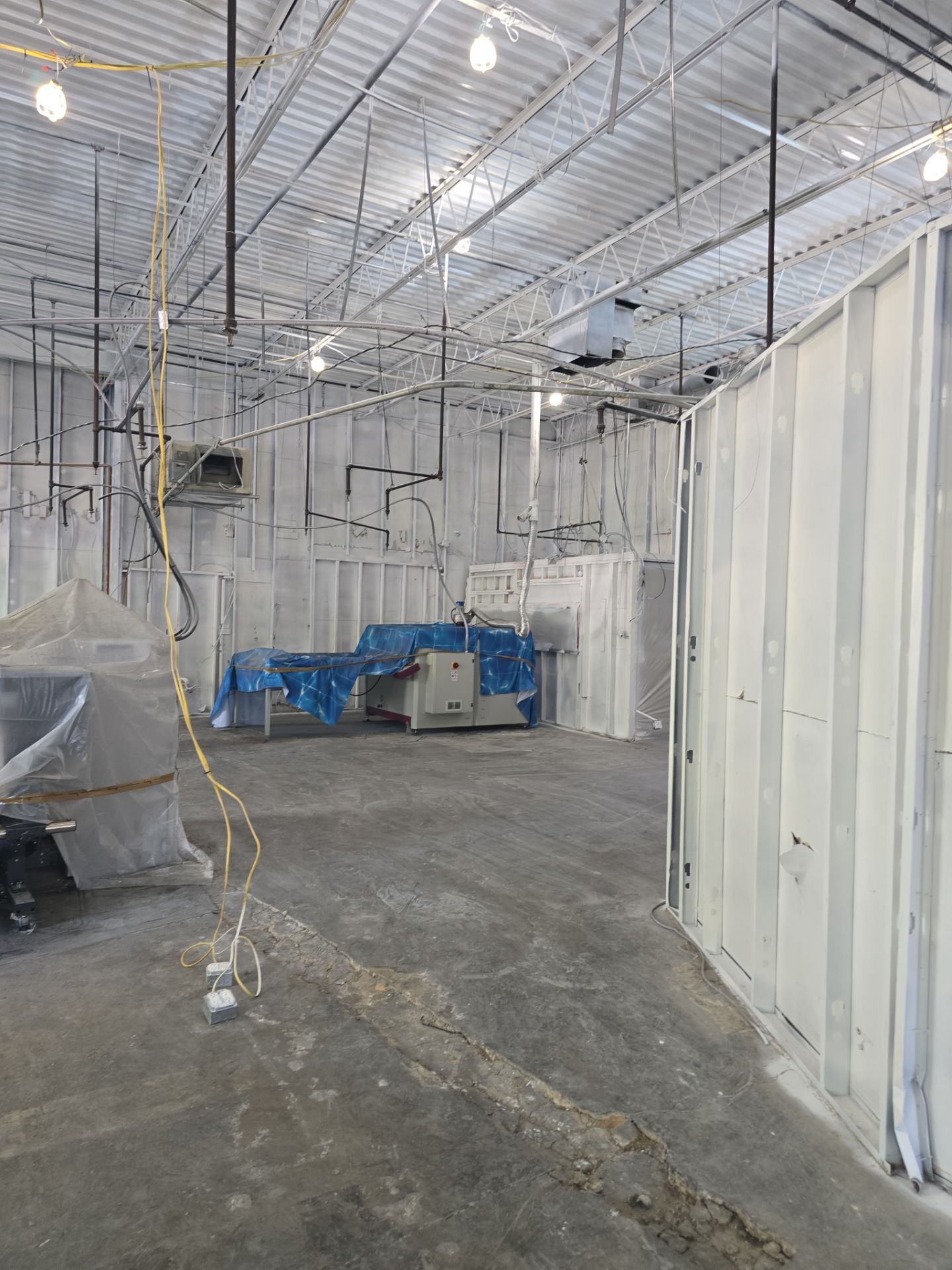 Industrial Warehouse Fire Damage Cleaning and Spray Sealing in Islandia by EMS Restoration Corp