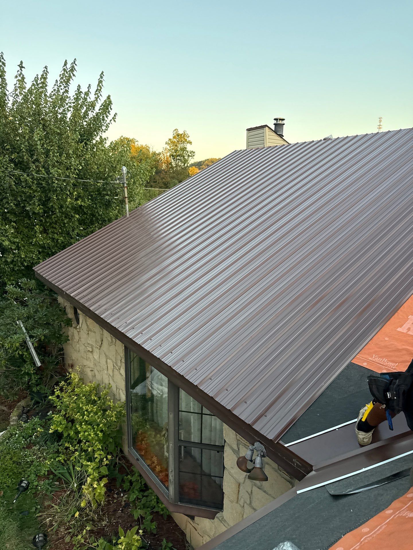 Residential Roofing Installation using Metal by Rainstoppers Roofing