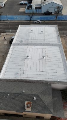 Commercial Roofing Installation using Modified Bitumen, Torch