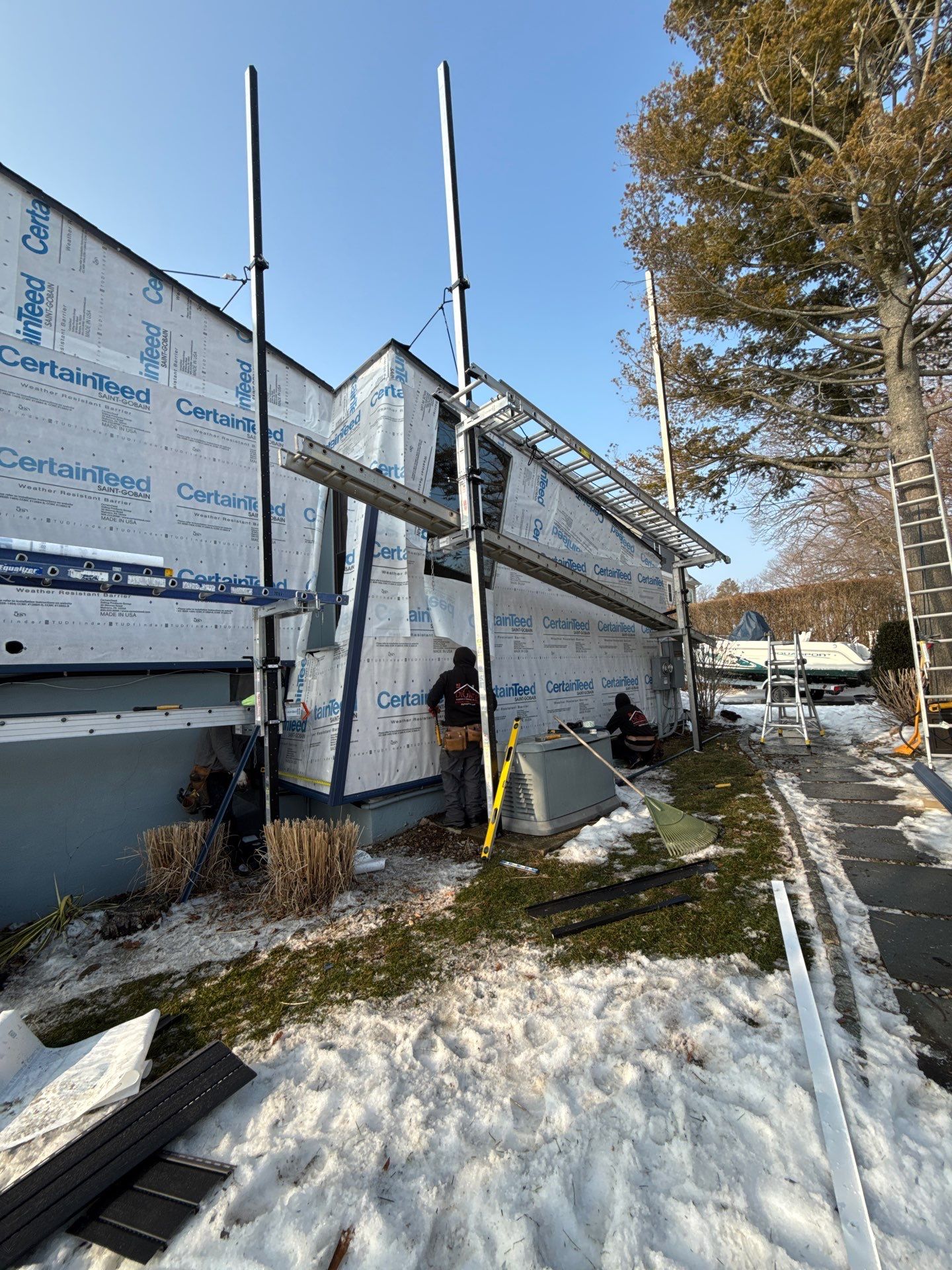 Siding Renewal with Cert S/7 Reverse Board & Batten, Midnight Blue by DiGiorgi Roofing and Siding Inc