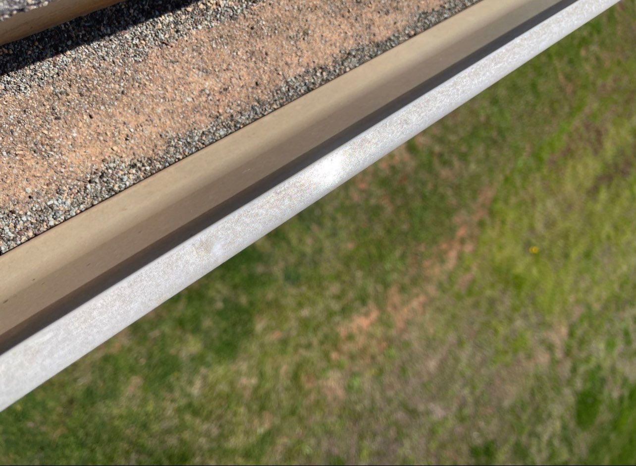Hail Damage on a Roofing System by Icon Roofing And Construction 