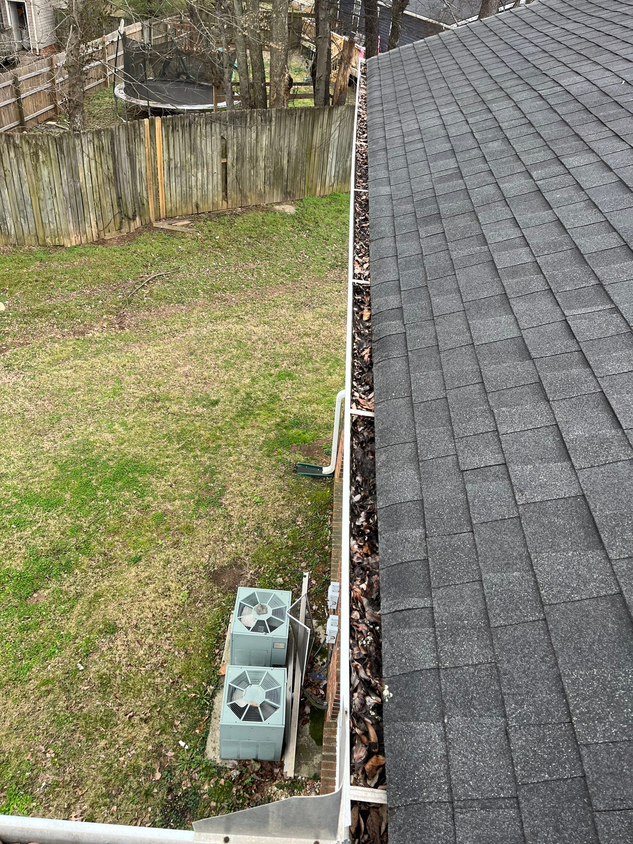 Commercial gutter cleaning Franklin & Murfreesboro before photo with filled gutters