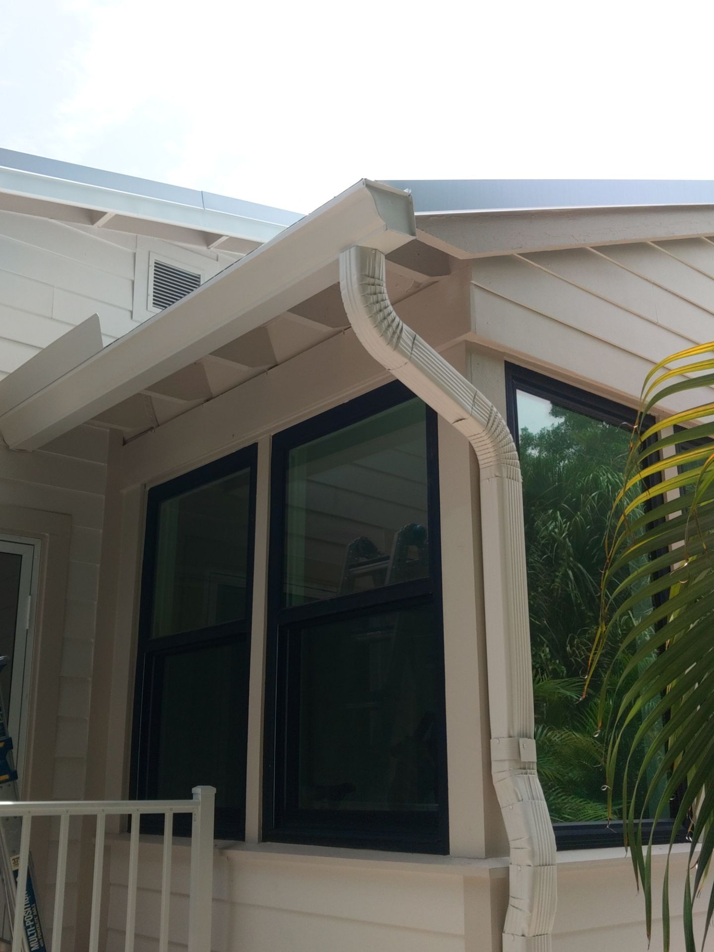 Aluminum Seamless Gutters using 3X4 Elbow Downspout in Sarasota FL by Gutter Professors