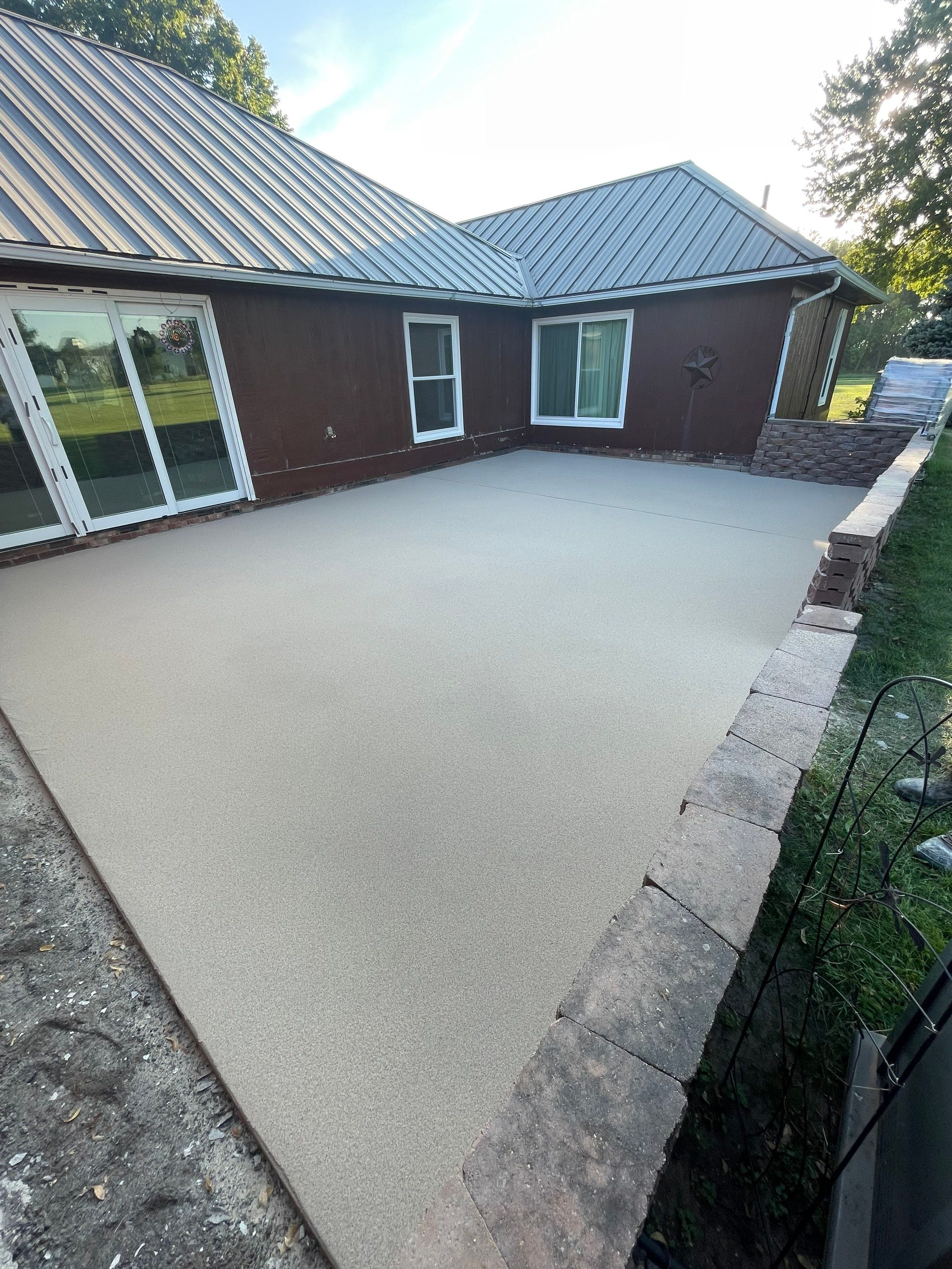 Concrete Patio Resurfacing and Protective Coating in Winfred, South Dakota by Select Painting, Coatings & Garage Cabinets