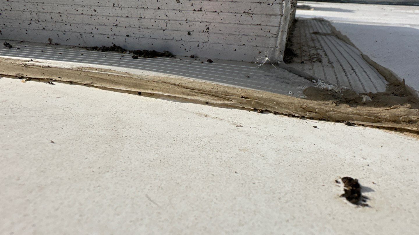 Single-ply roofing system on porch using TPO 60 mil by Straight Edge Roofing Inc