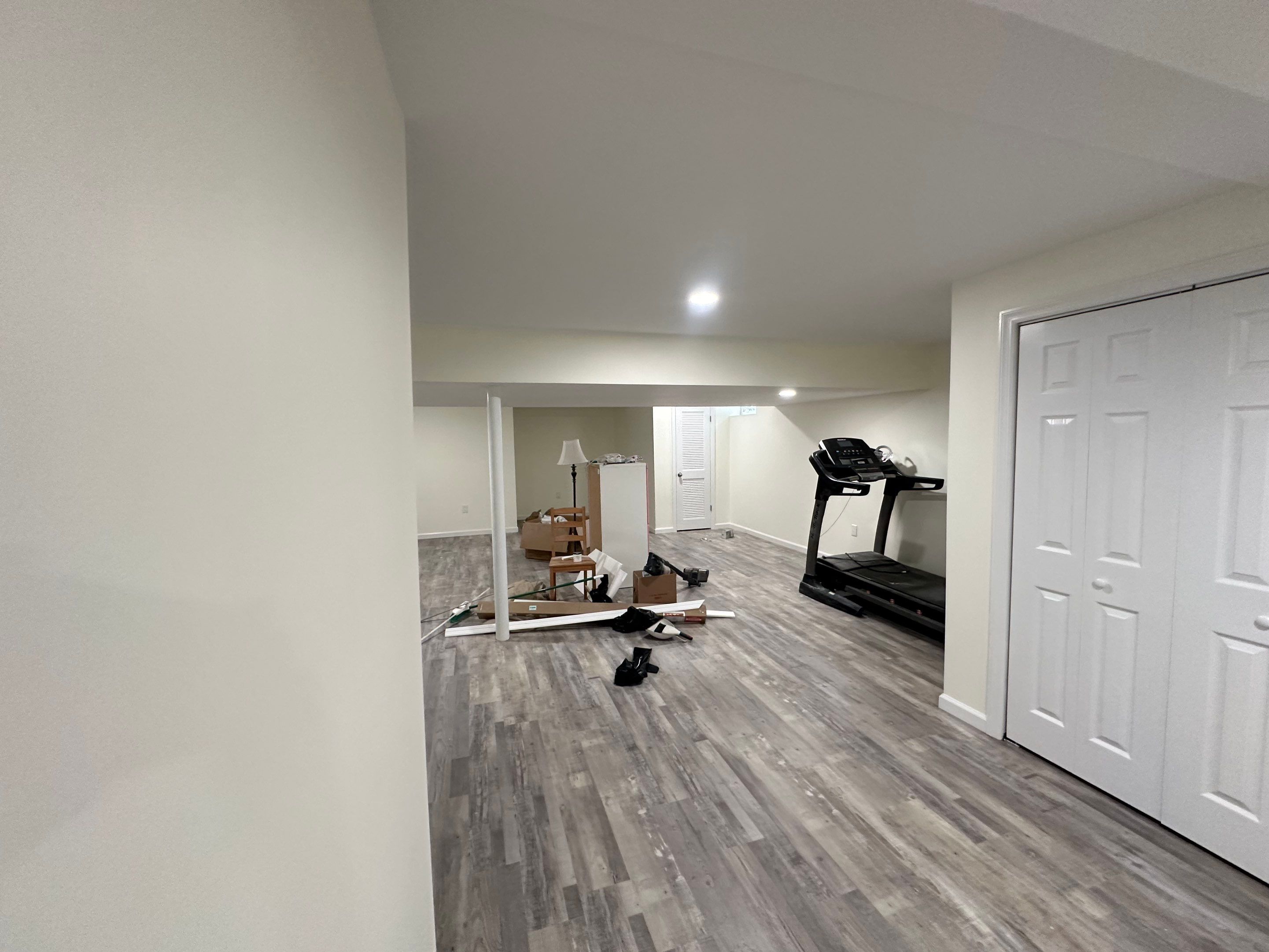 Basement Remodel using Wood by Home Concepts Construction