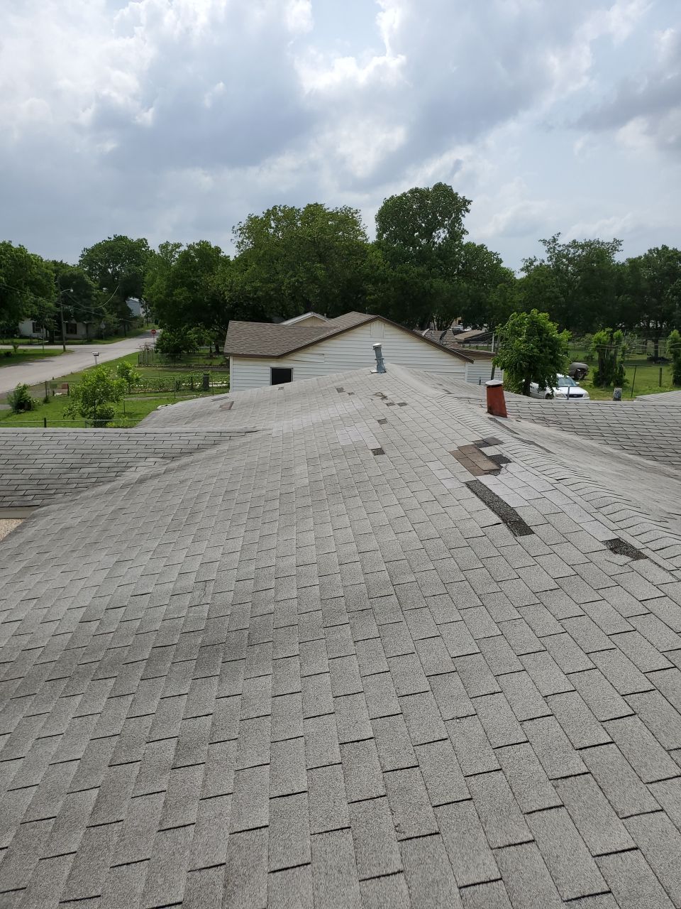 Residential Roofing Installation using Roofing Shingles by Harvey Roofing & Construction