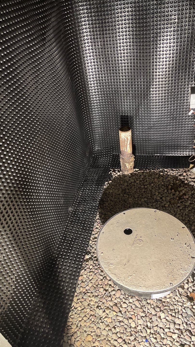 Interior Drain Tile & Sump Pump System in West Minneapolis by Waterproofing Northeast