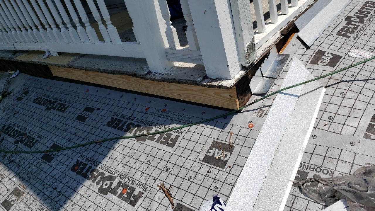 Residential Roofing Installation using Roof Replacement by American Roofing & Construction LLC