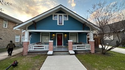 Blue sliding/brick columns on the porch with Malarkey Storm Grey