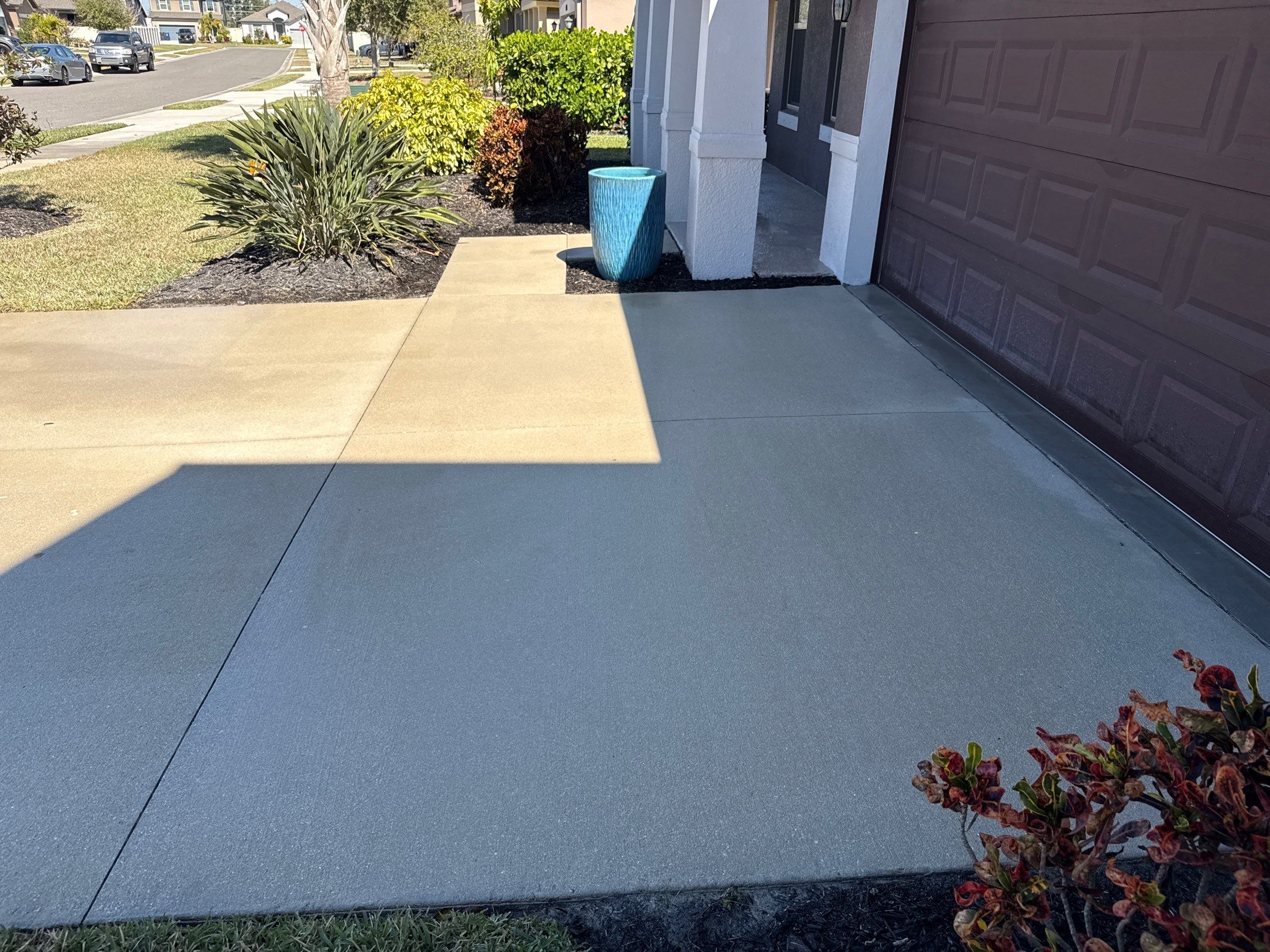 2-Car Concrete Driveway & Sidewalk Cleaning in Trevesta – Palmetto, FL by Sunshine AquaWash