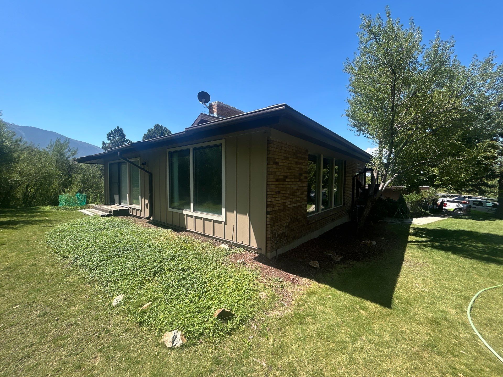 Complete Hardie Colorplus Board and Batten replacement with Custom Soffit Transformation in Sandy by Ideal Siding Utah