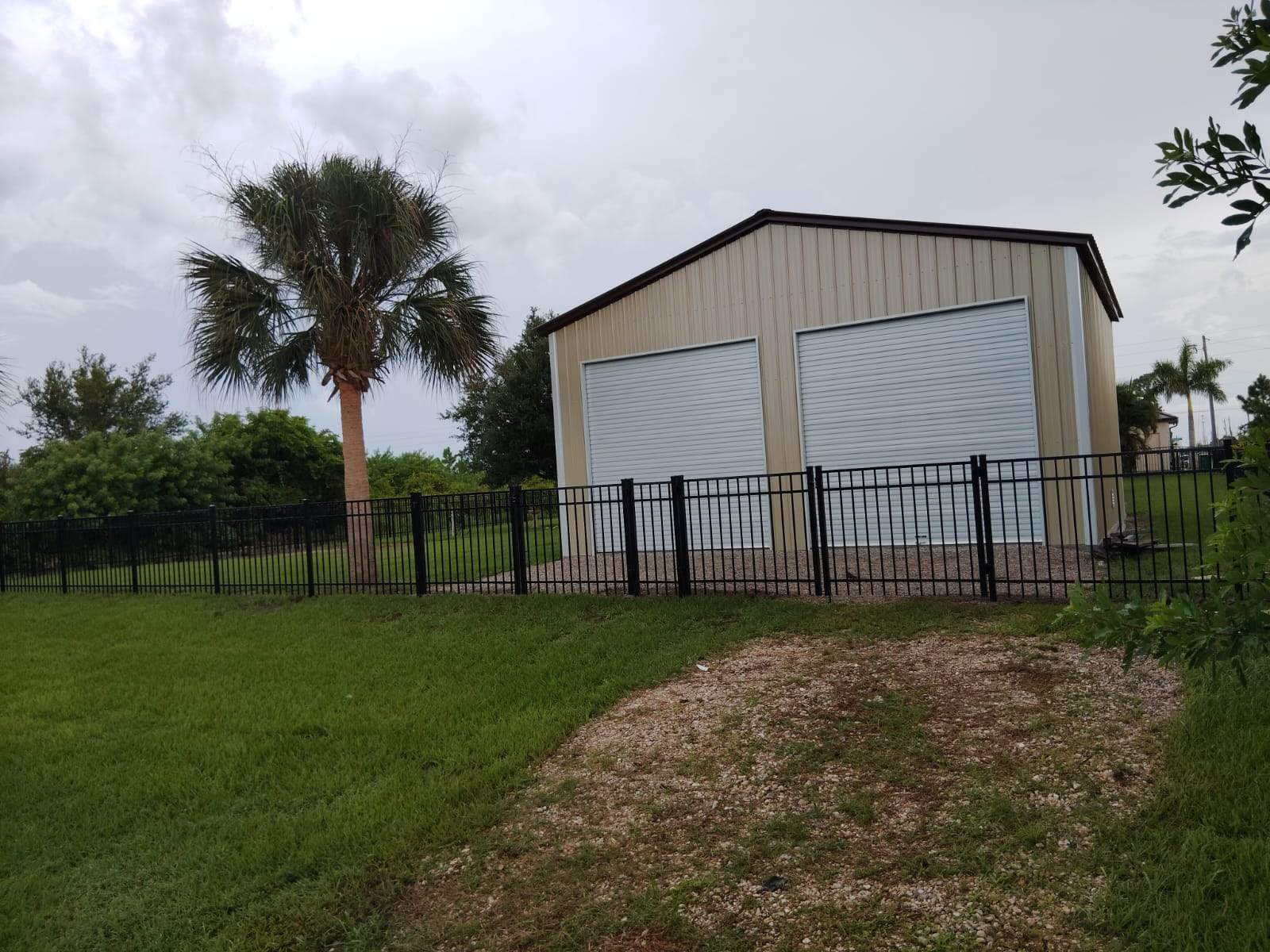 Black Aluminum Picket Fence Installation for Port Charlotte Residence by True Fence LLC