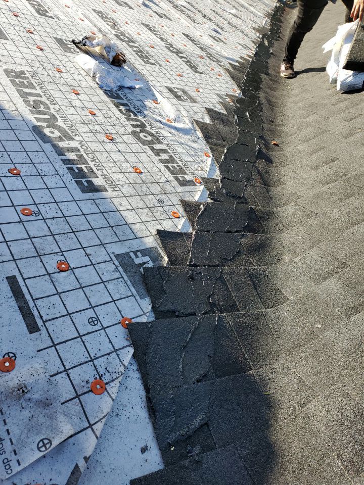 Residential Roofing Installation using Roof Replacement by American Roofing & Construction LLC