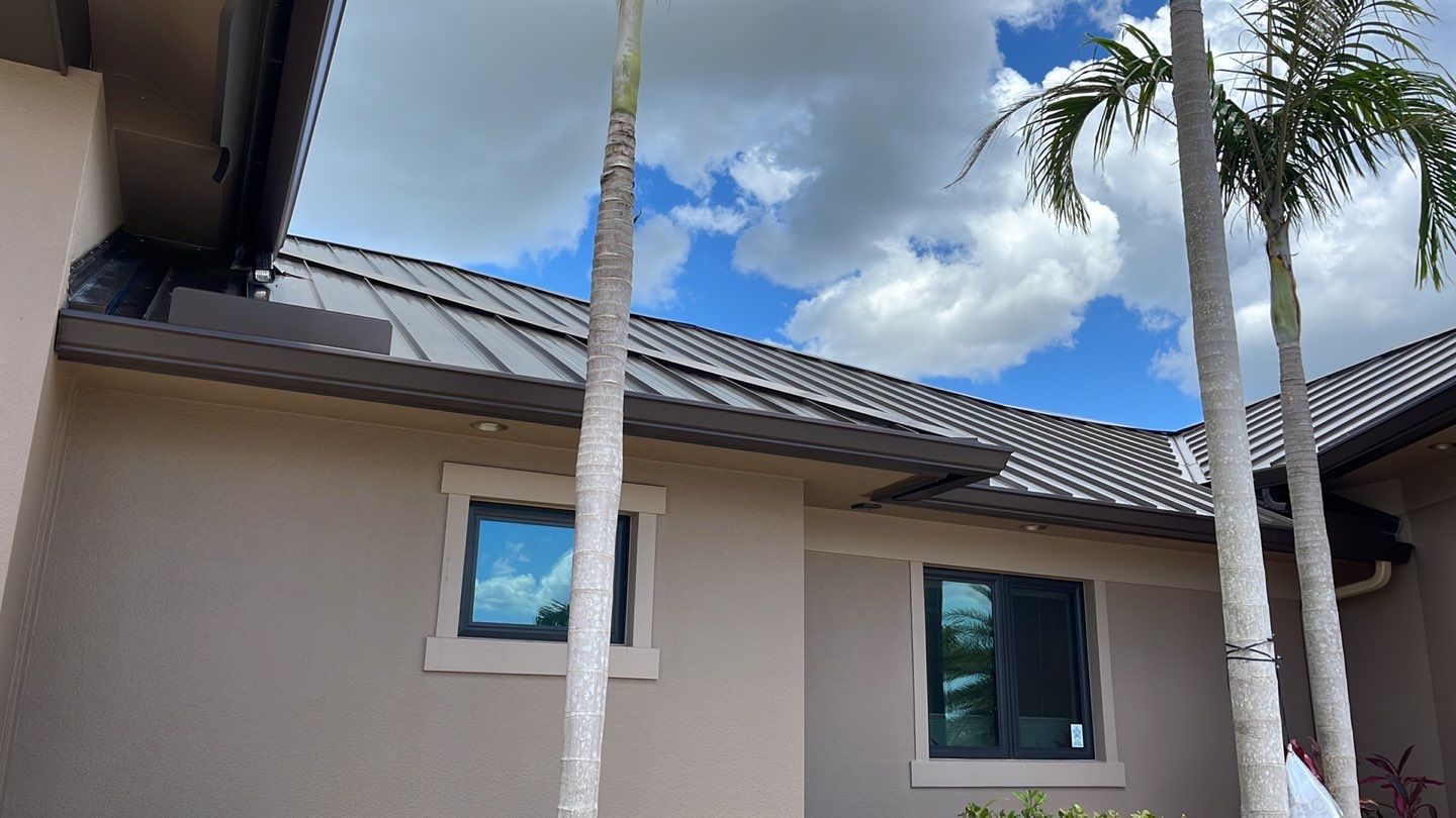 Residential Roofing Installation using Standing Seam Metal Roof in Cape Coral, FL by International Roofing