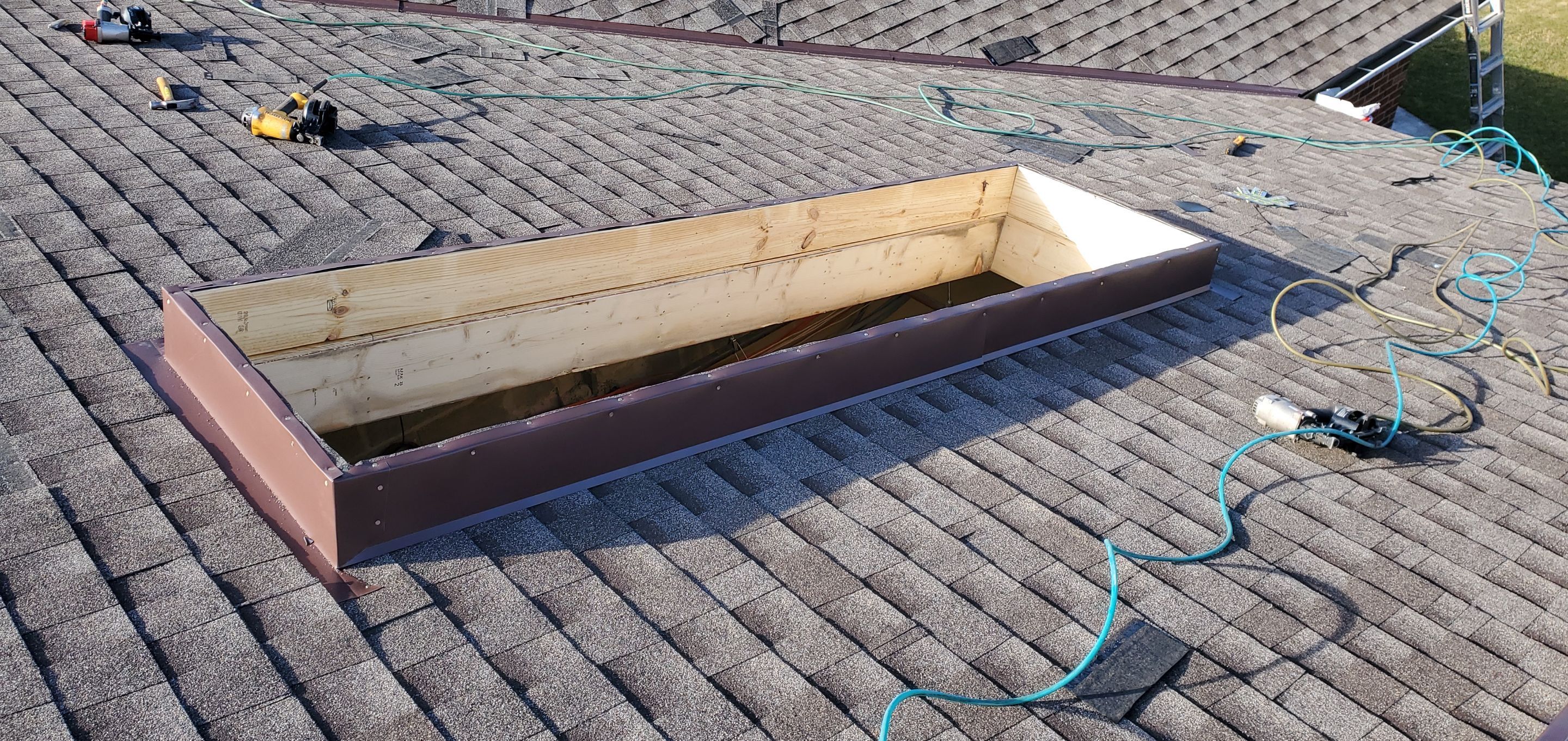 Skylight removal and install  by Absolute Roofing and Construction