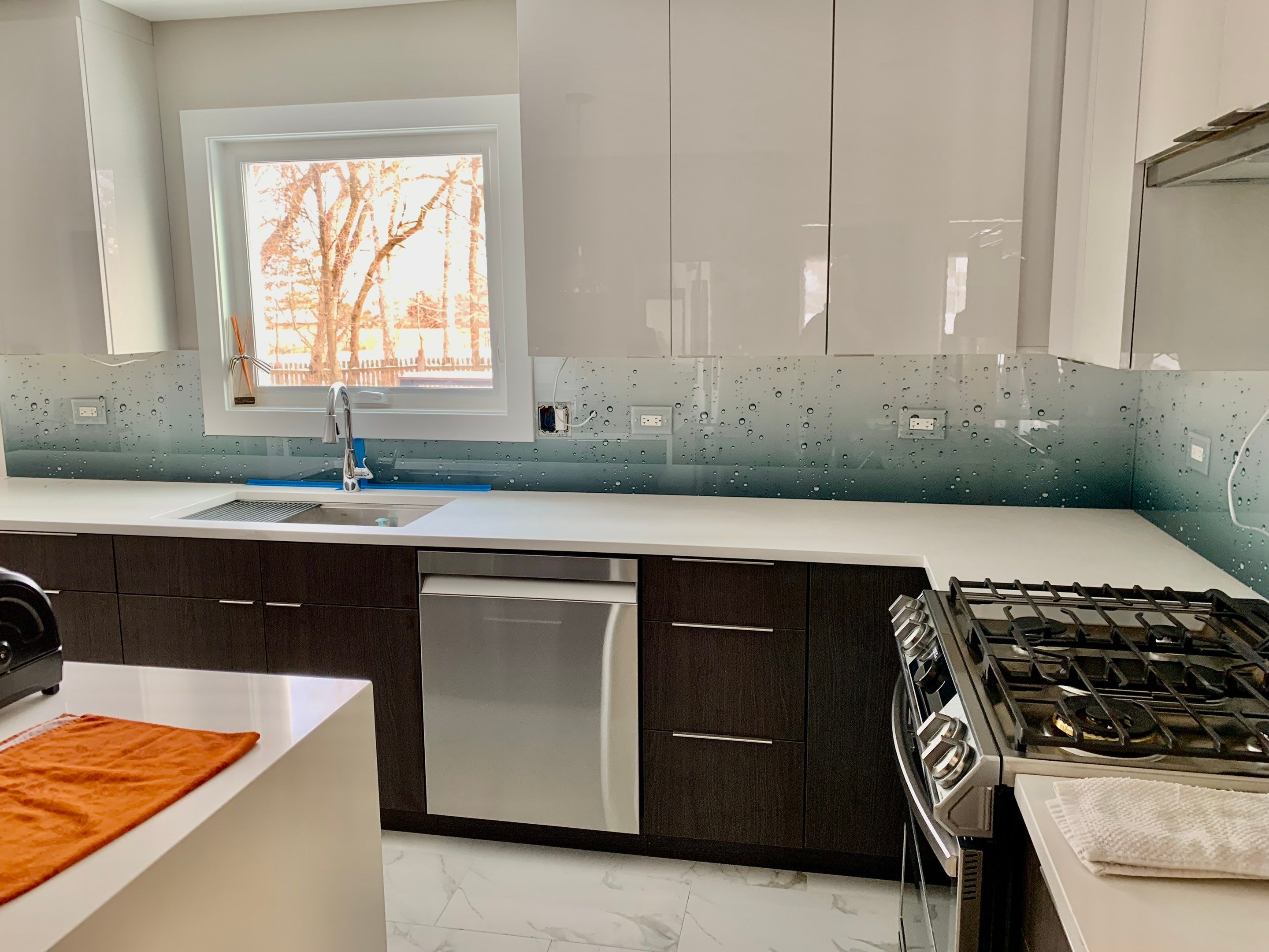 Let It Rain Kitchen Remodel using IMAGIO Solid Glass Backsplash by IMAGIO