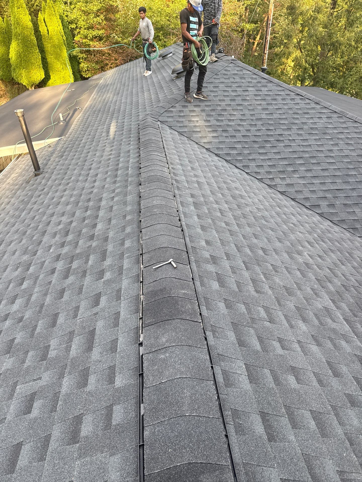 Residential Roofing Installation using GAF Timberline HDZ Charcoal by Rainstoppers Roofing