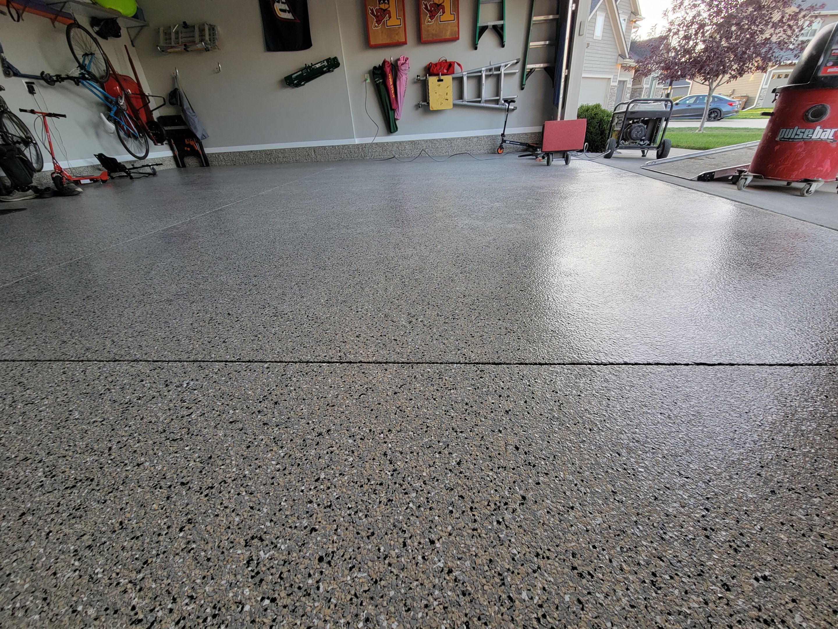 Grimes, IA Transformation: Professional Grade Garage Floor Coating by Revival Concrete Coatings