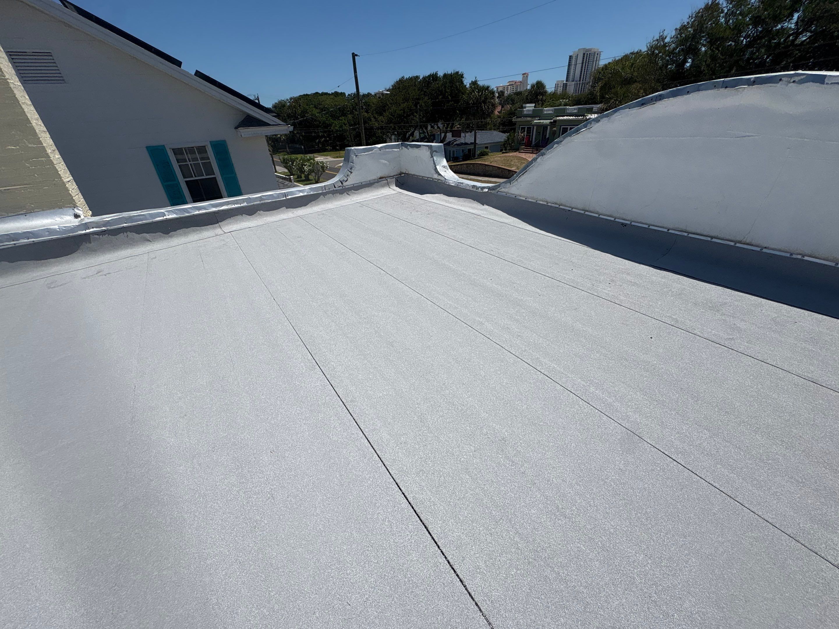 Flat Reroof Replacement Daytona Beach FL by Pinnacle Roofing Group