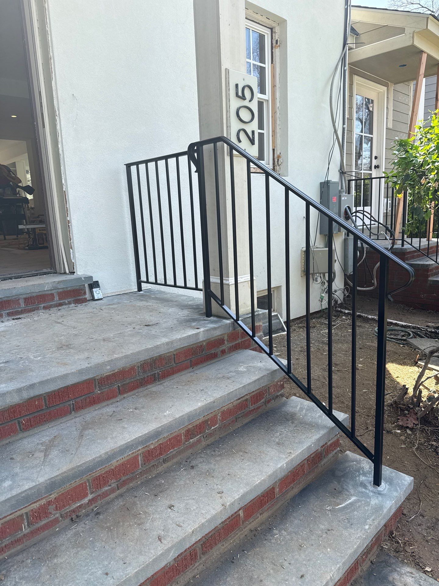 Custom Brick Step and Metal Railing Installation in Silver Spring by Capitol Iron Works