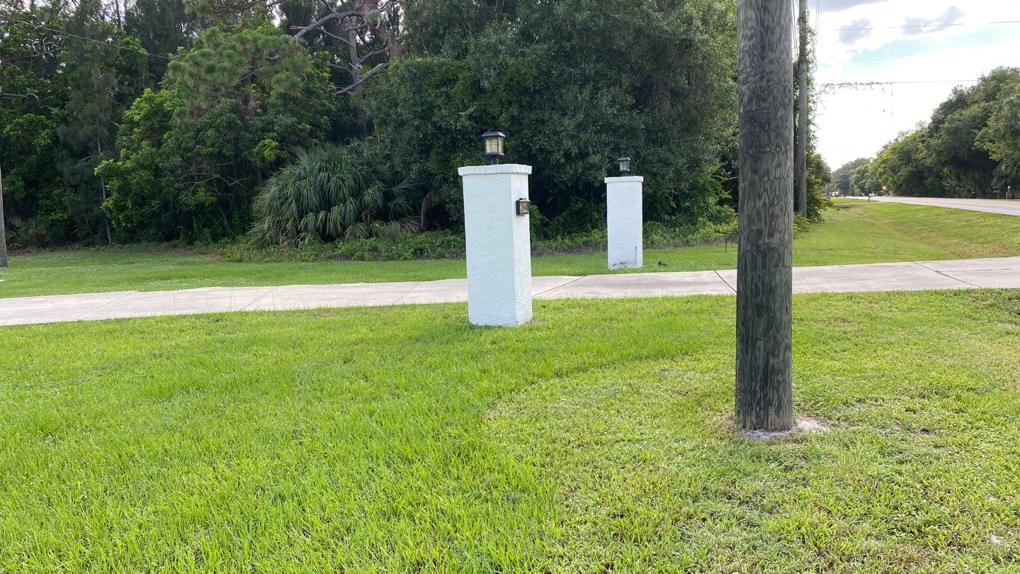 Sarasota, FL. Vinyl Fence Installation using Tan Vinyl Louvered Vinyl Fence by Asap fence and gates, LLC