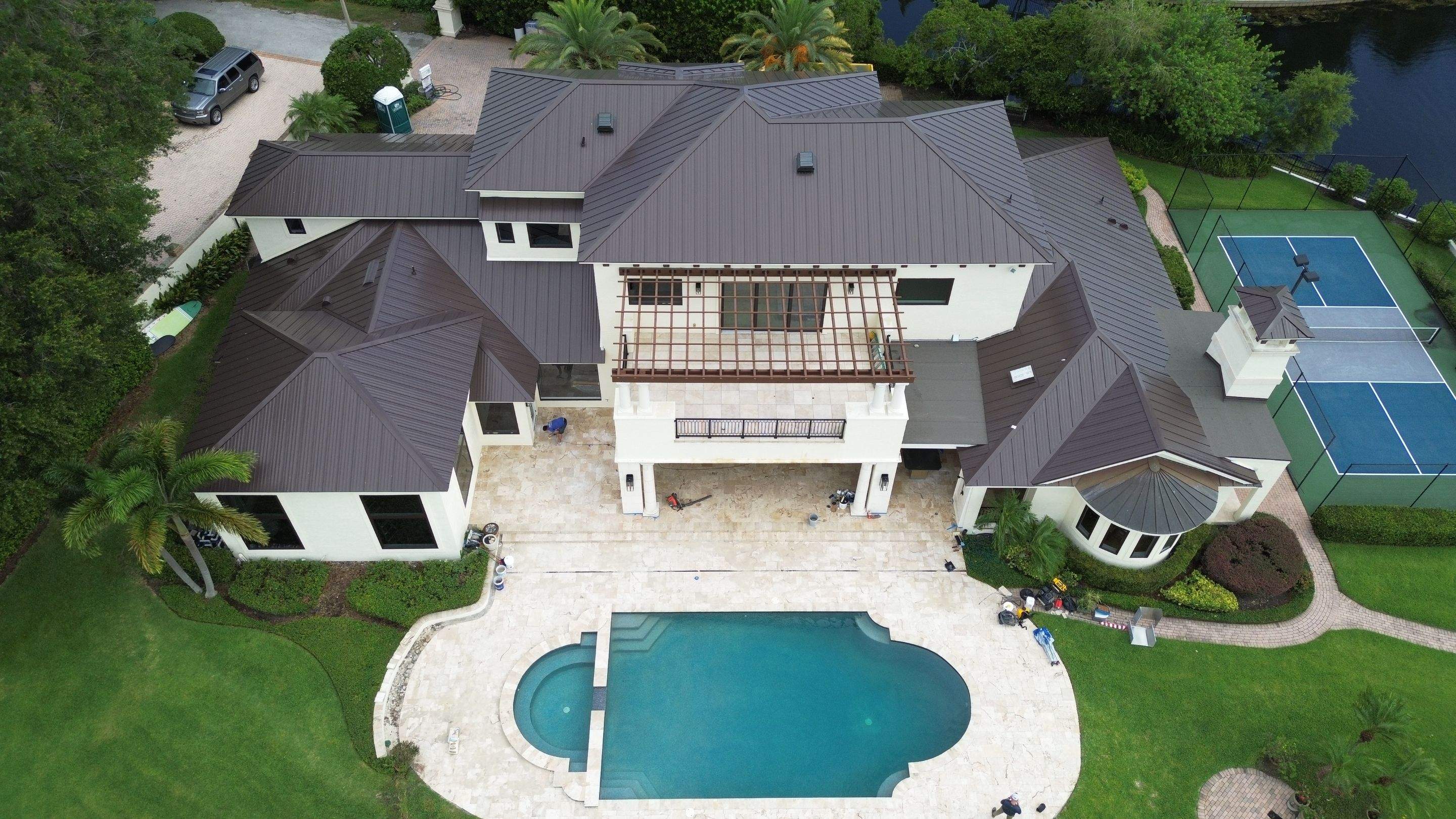Standing seam metal roof on Lake Conway FL by Gold Key Roofing