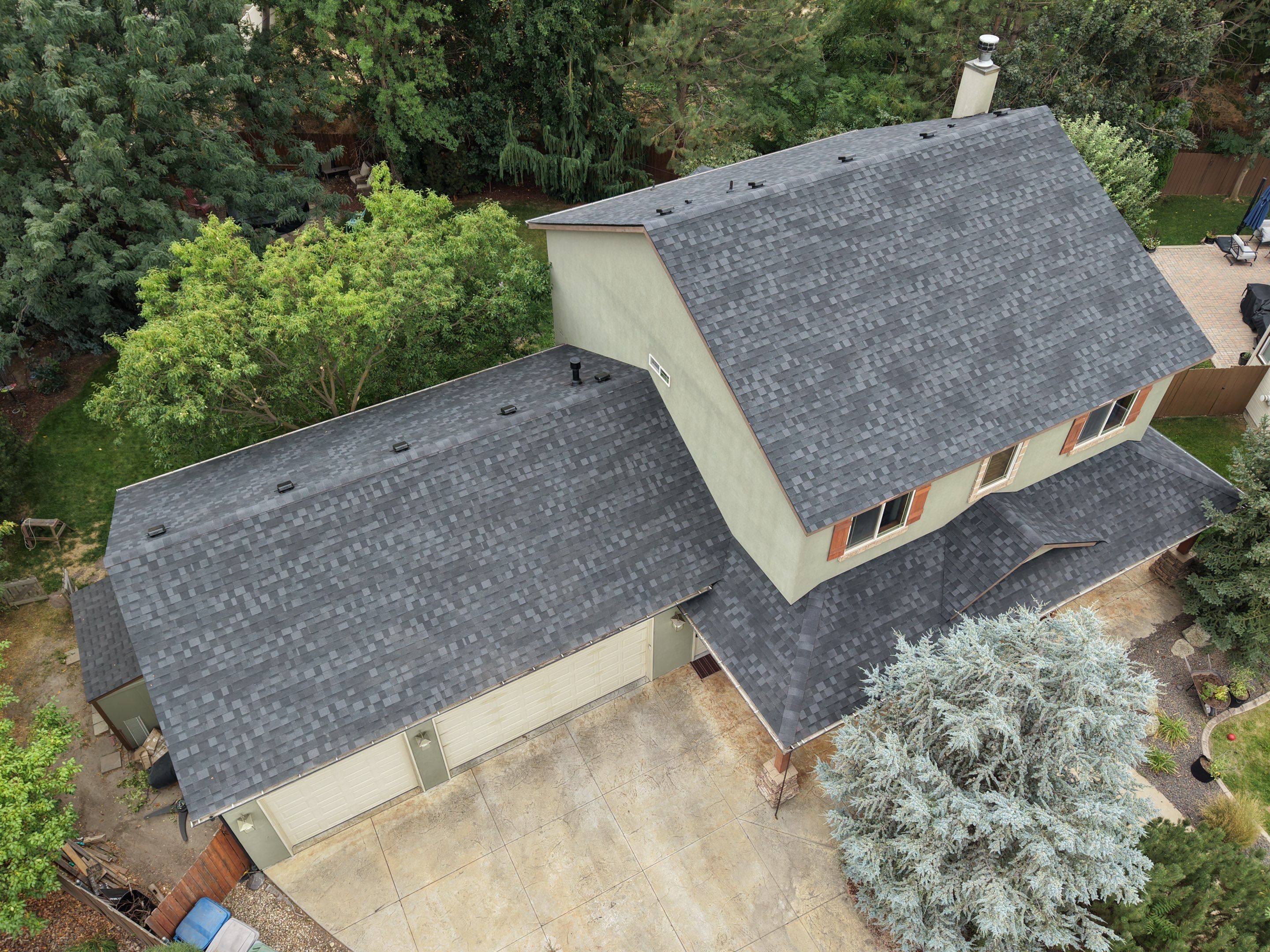 Residential Roof Replacement for Two-Story Stucco Home in Star by Olive Roofing