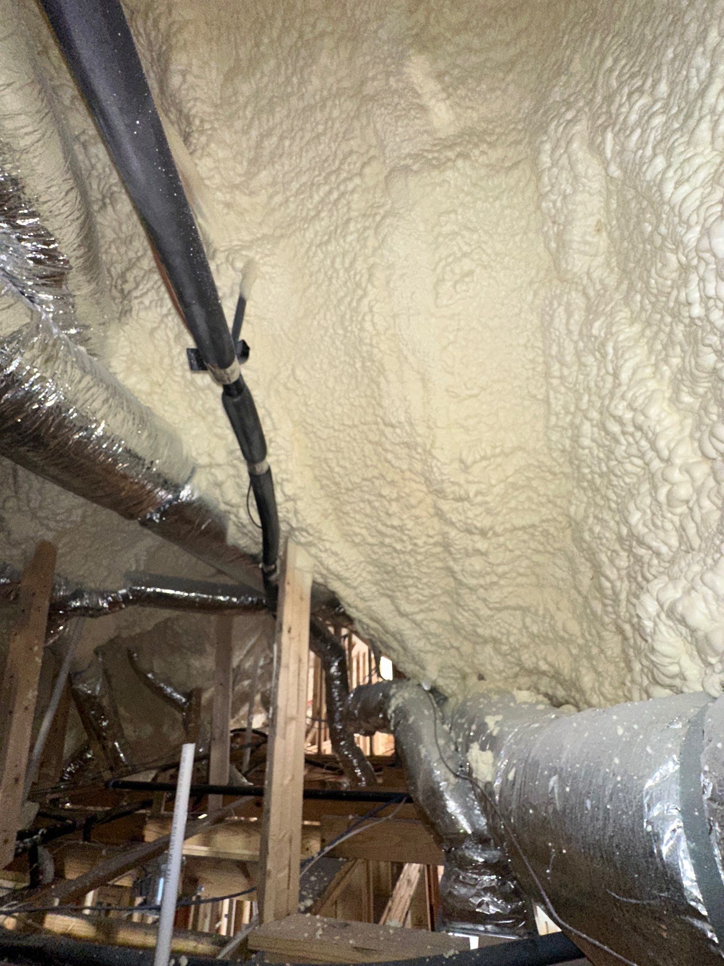 Full encapsulation with open cell spray foam on this custom home in Dallas by Apex Insulation Solutions