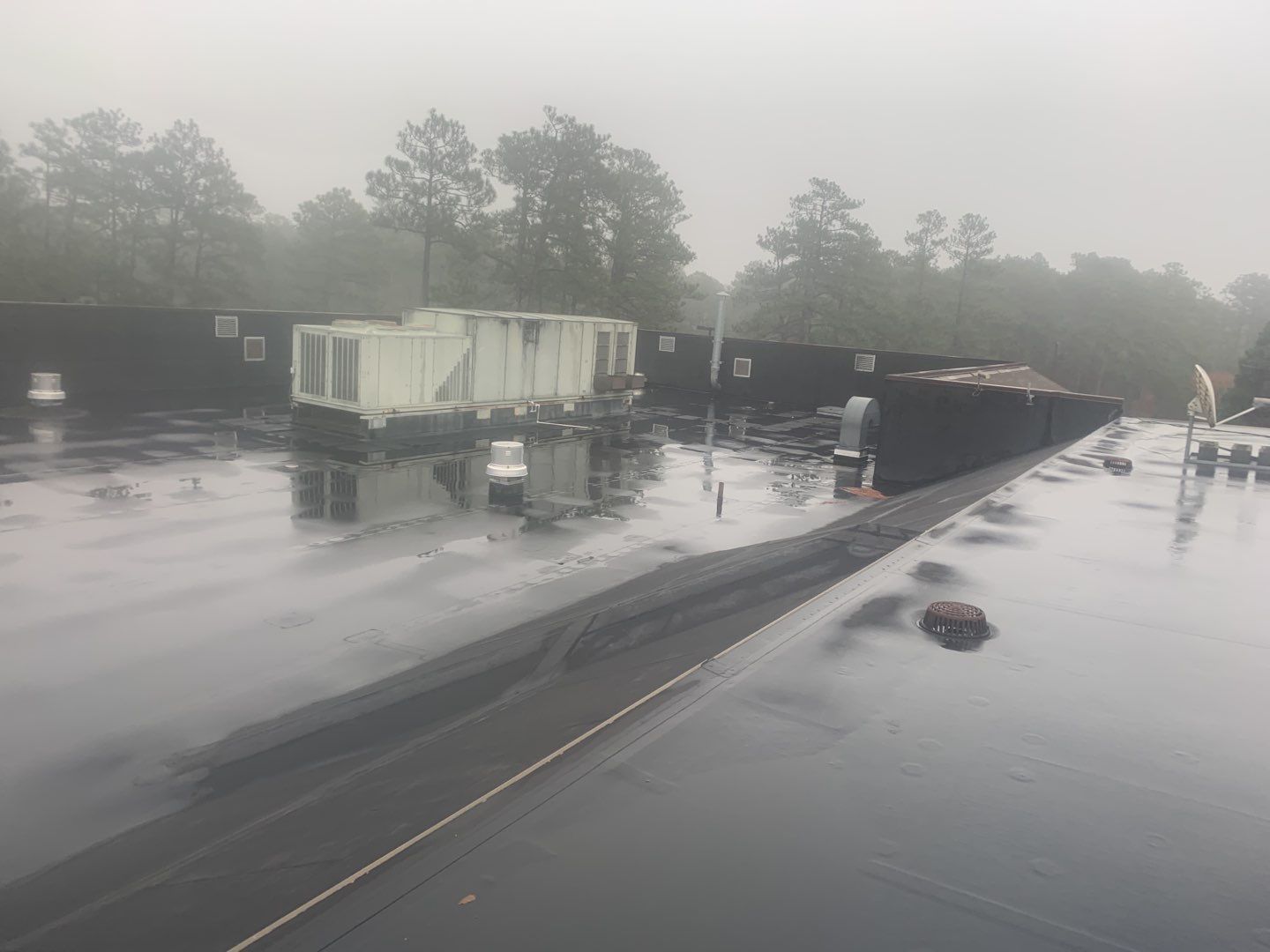 Re Roof (TPO) by American Roofing NC