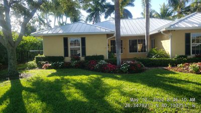 Residential Roofing Installation using 1" Nail strip metal roof