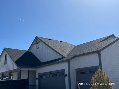 Residential Roofing Installation using Atlas Pinnacle Impact Black Shadow