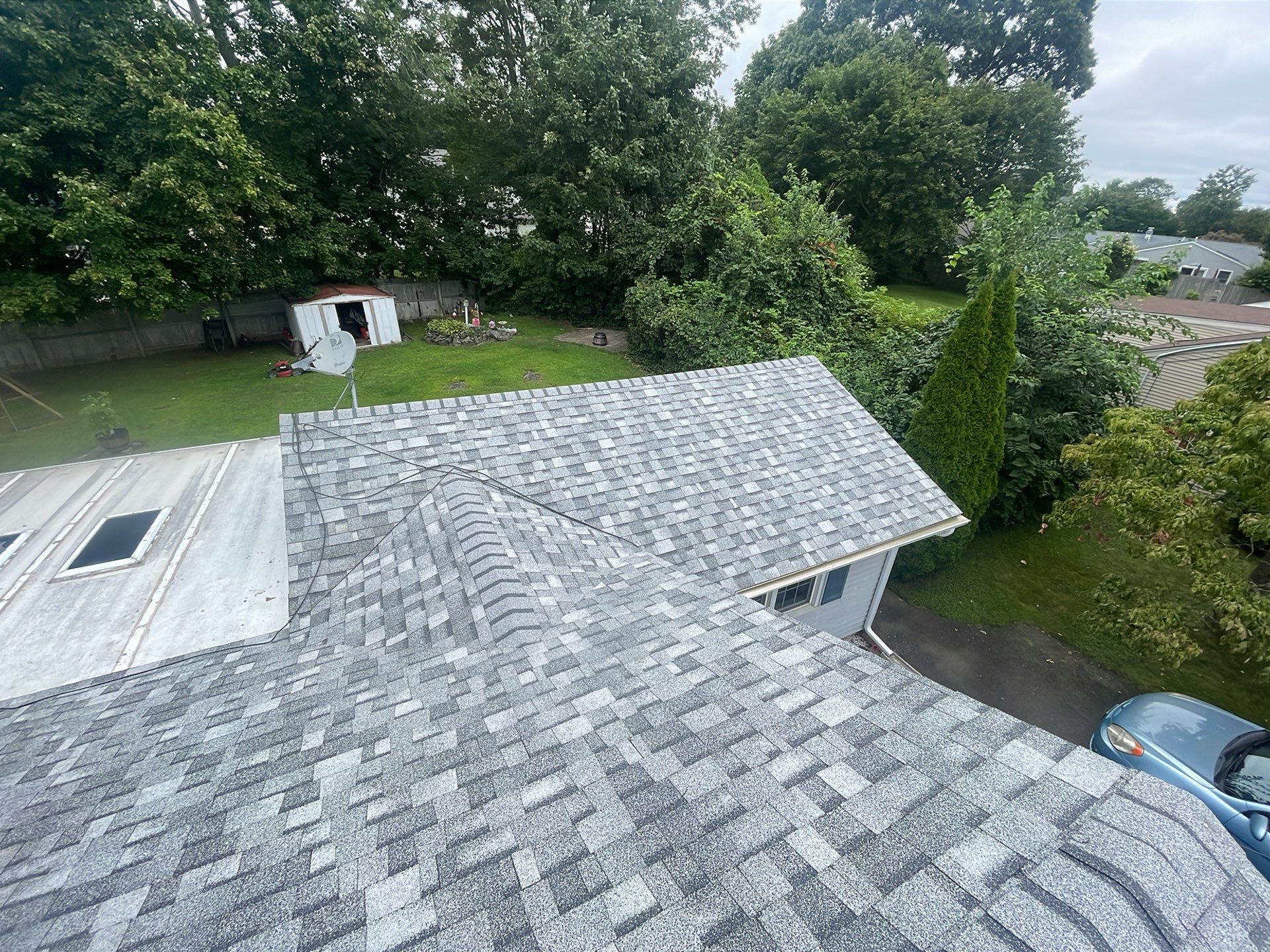 Residential Roofing Installation using Owens Corning TruDefinition Sierra Gray by A Plus Exterior