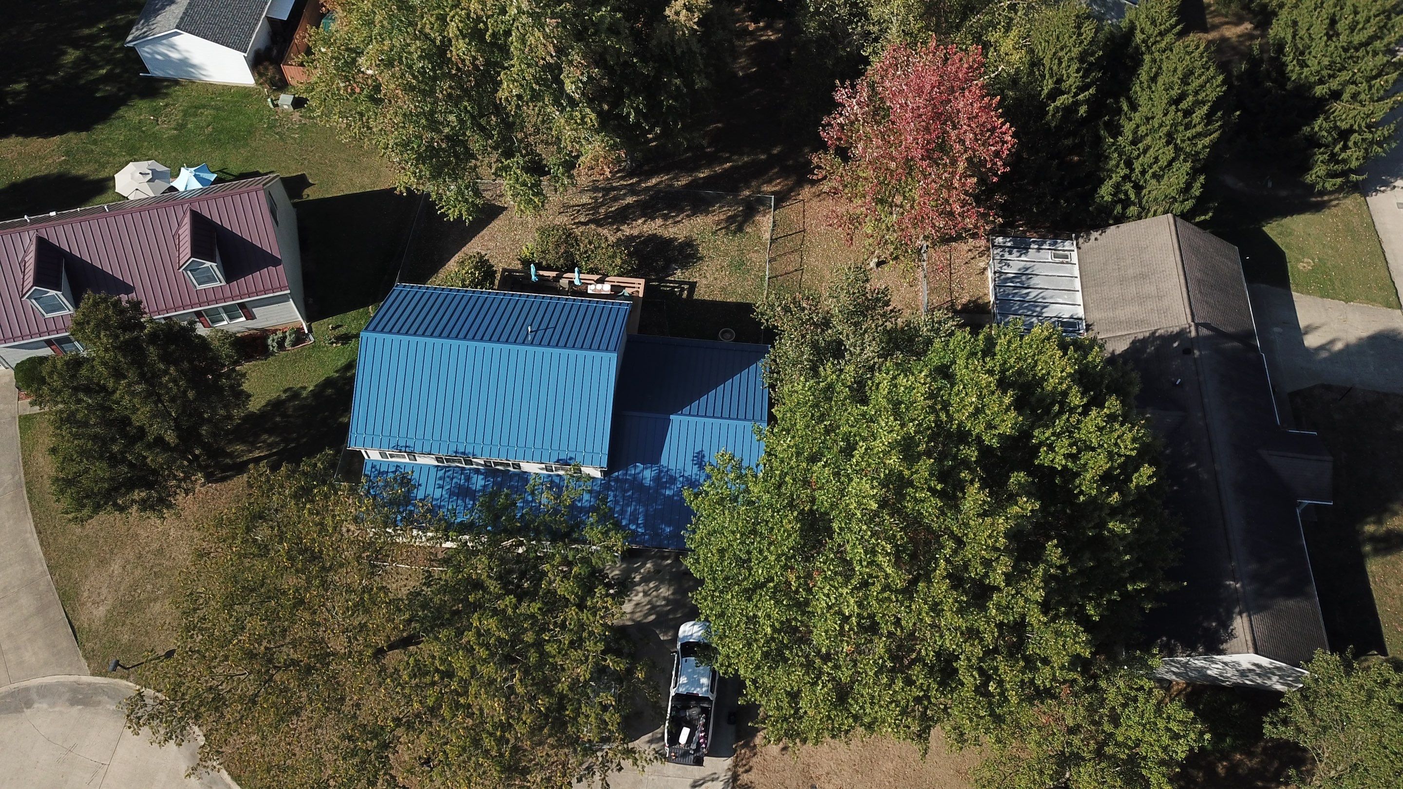 Residential Roofing Installation using Standing Seam Metal - Gallary Blue by RoofX 