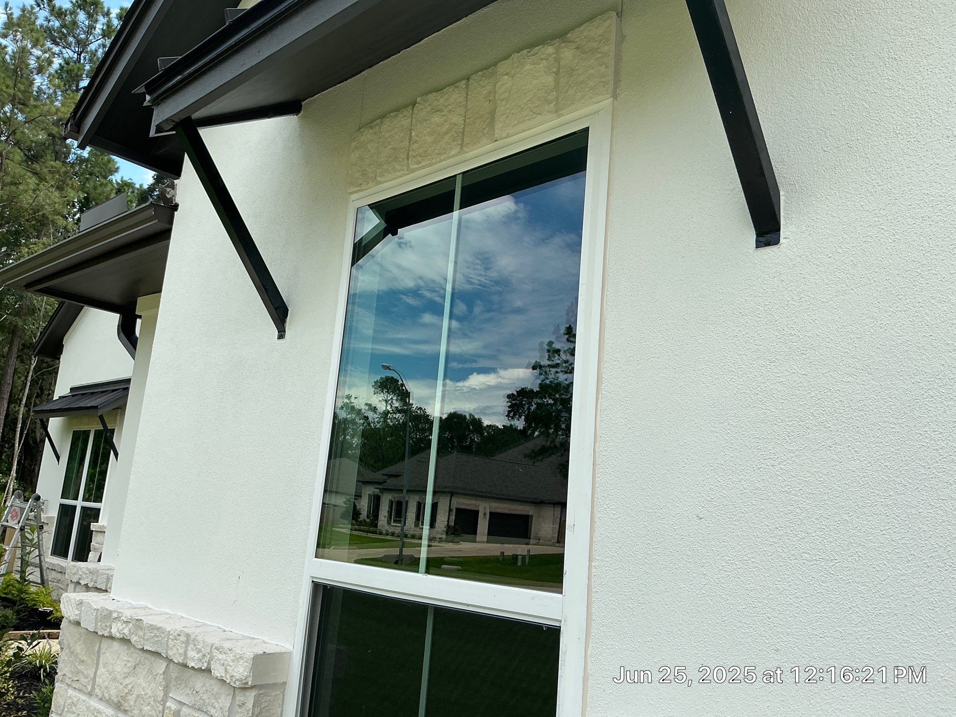 Conroe Harmony: Sand Finish Stucco with Natural Stone Accents by Apex Conventional Stucco Llc