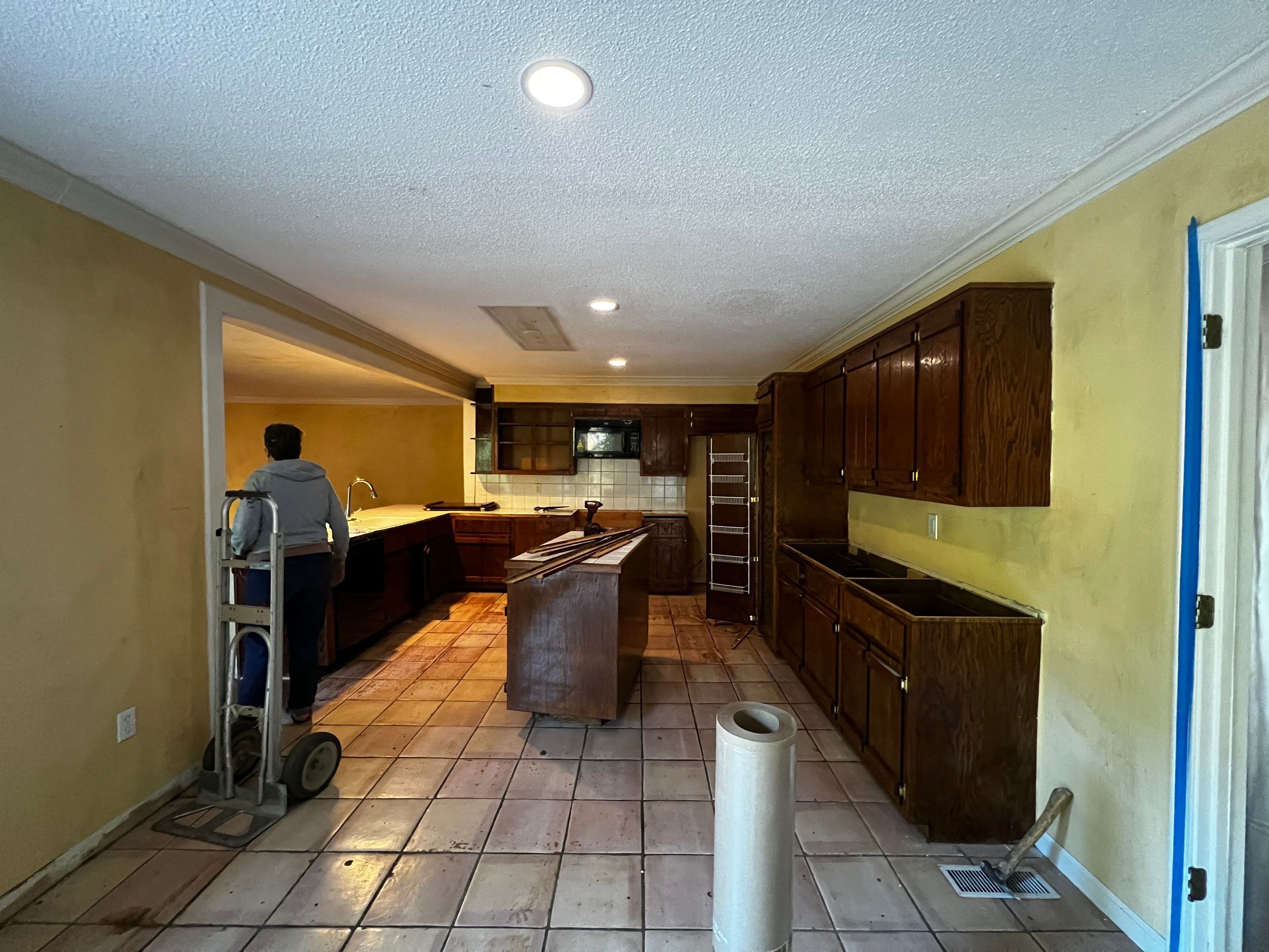 Kitchen and Living Area Renovation Featuring Hardwood Flooring in Smyrna by Swift Home Renovations