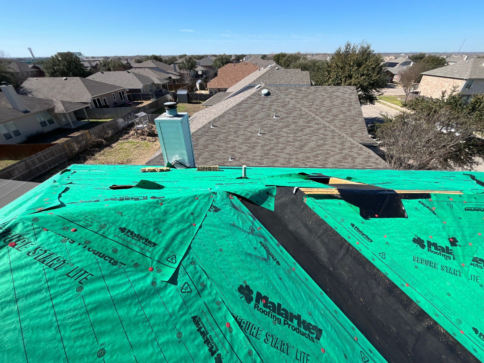 Reroof and Gutters by Berry Good Roofing 