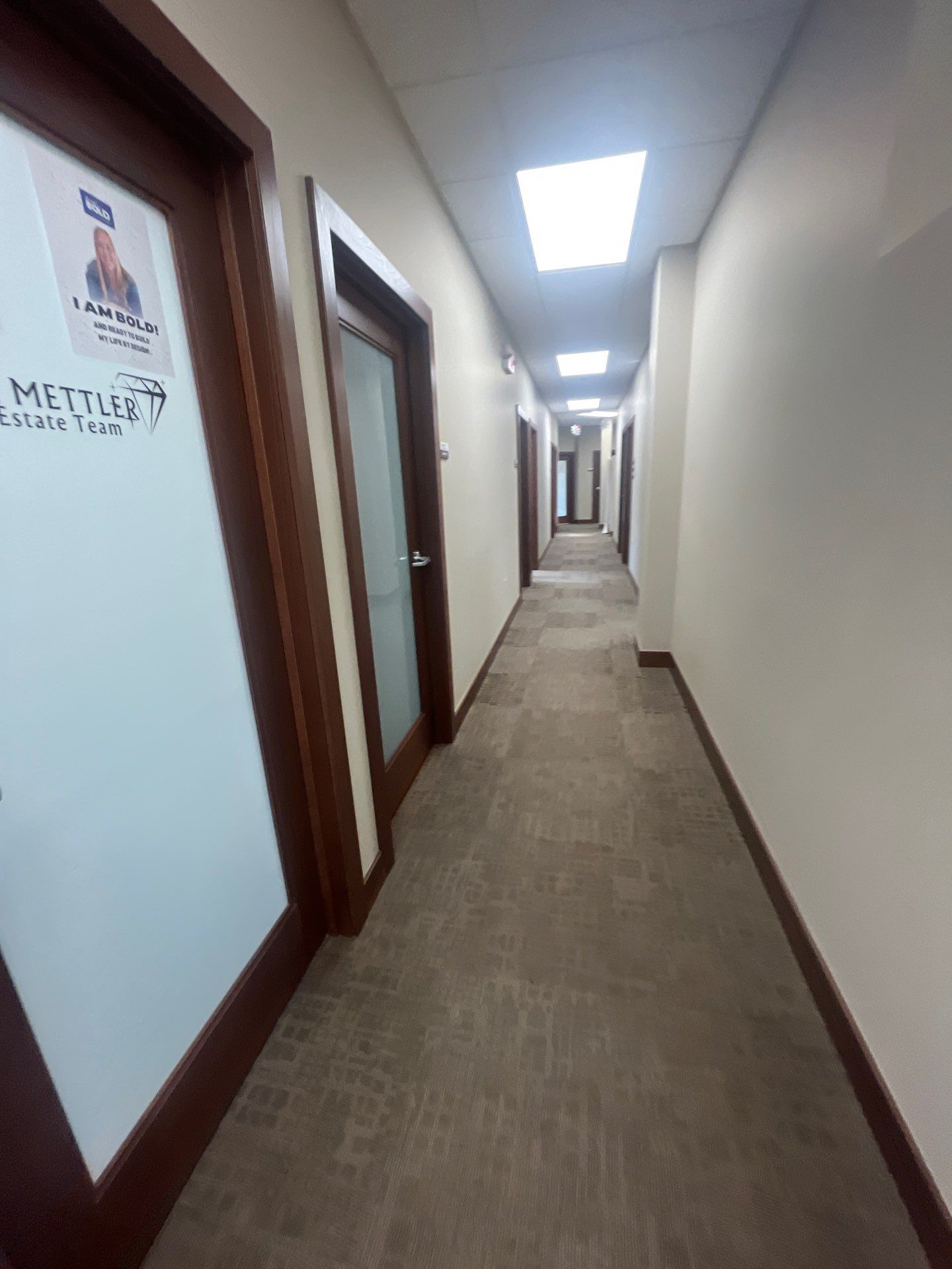 Commercial Office Interior Remodel and Modern Suite Refresh in Sioux Falls by Select Painting, Coatings & Garage Cabinets