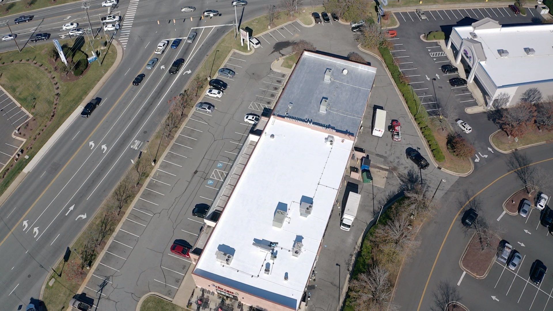 Commercial Coating using Poly Urerthane and Silicone Coating by Just In Time Roofing and Restoration