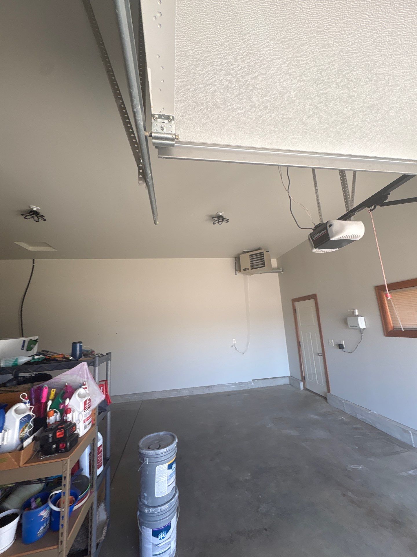 Residential Garage Interior Painting and Drywall Repair in Tea by Select Painting, Coatings & Garage Cabinets