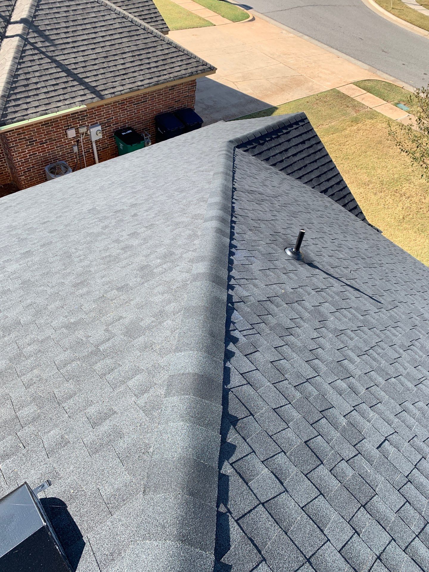 roof replacement & gutter installation in Edmond by McCann's Roofing and Construction