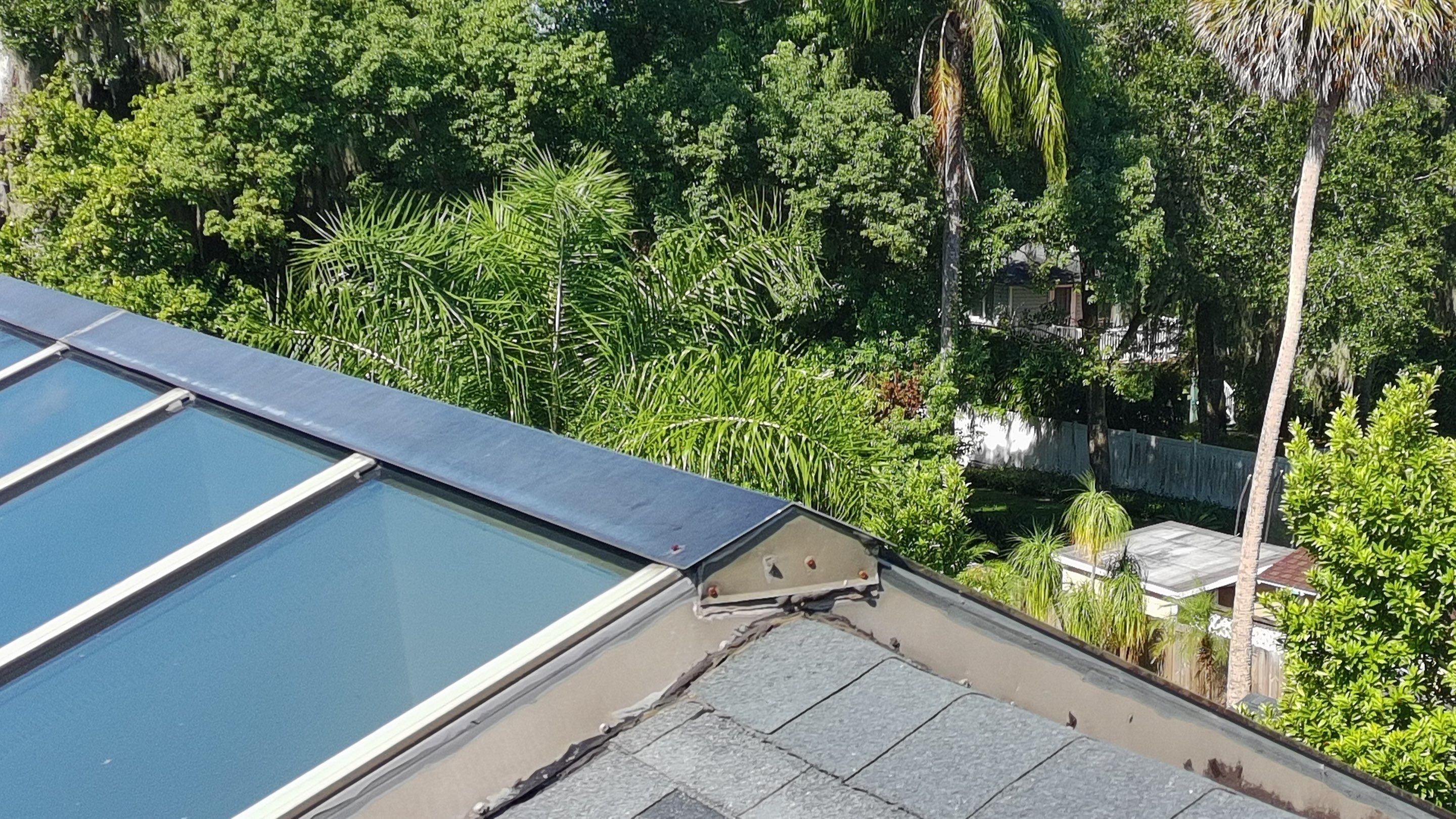 Ridge Skylight Repair and Shingle Roof Maintenance in Winter Park by Fortified Roofing Solutions Corp.