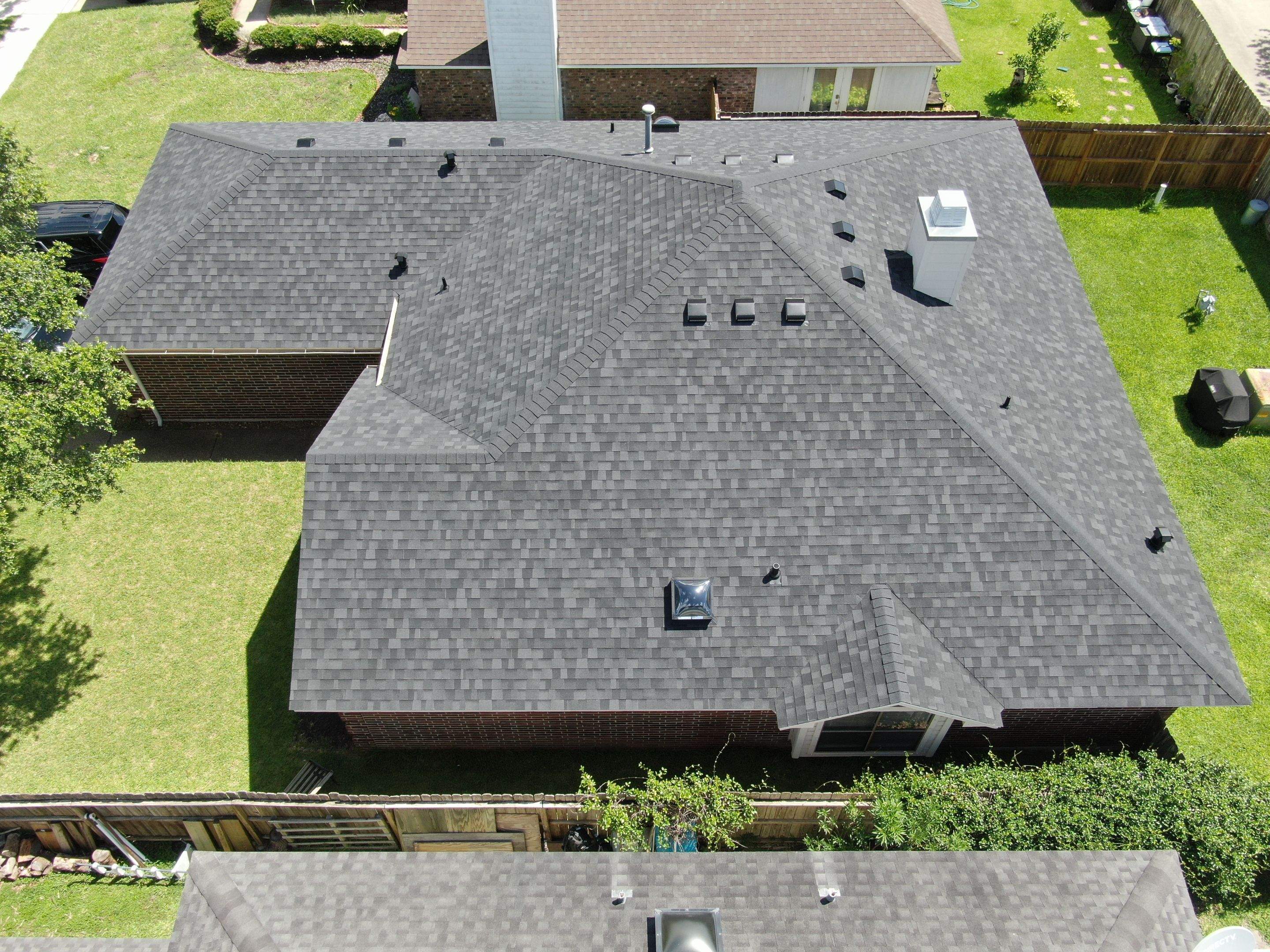 Nothing looks nicer than a little black roof by Bayfront Roofing and Construction