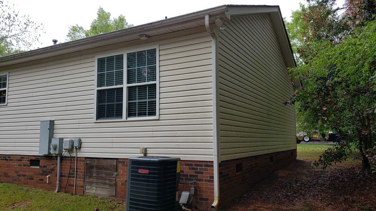 House Wash using cleaner by Power Wash Masters LLC