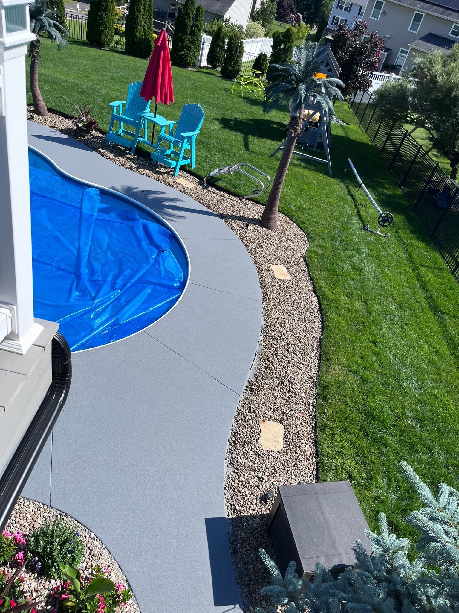 Twilight Pool Deck / Patio Project in Beaver falls by Floors in a Day, Inc