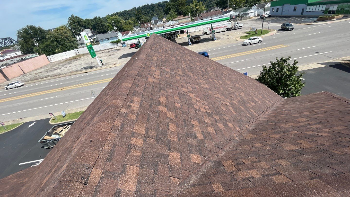 Commercial Roofing Installation using Performance Shingles by Mr. Roofer