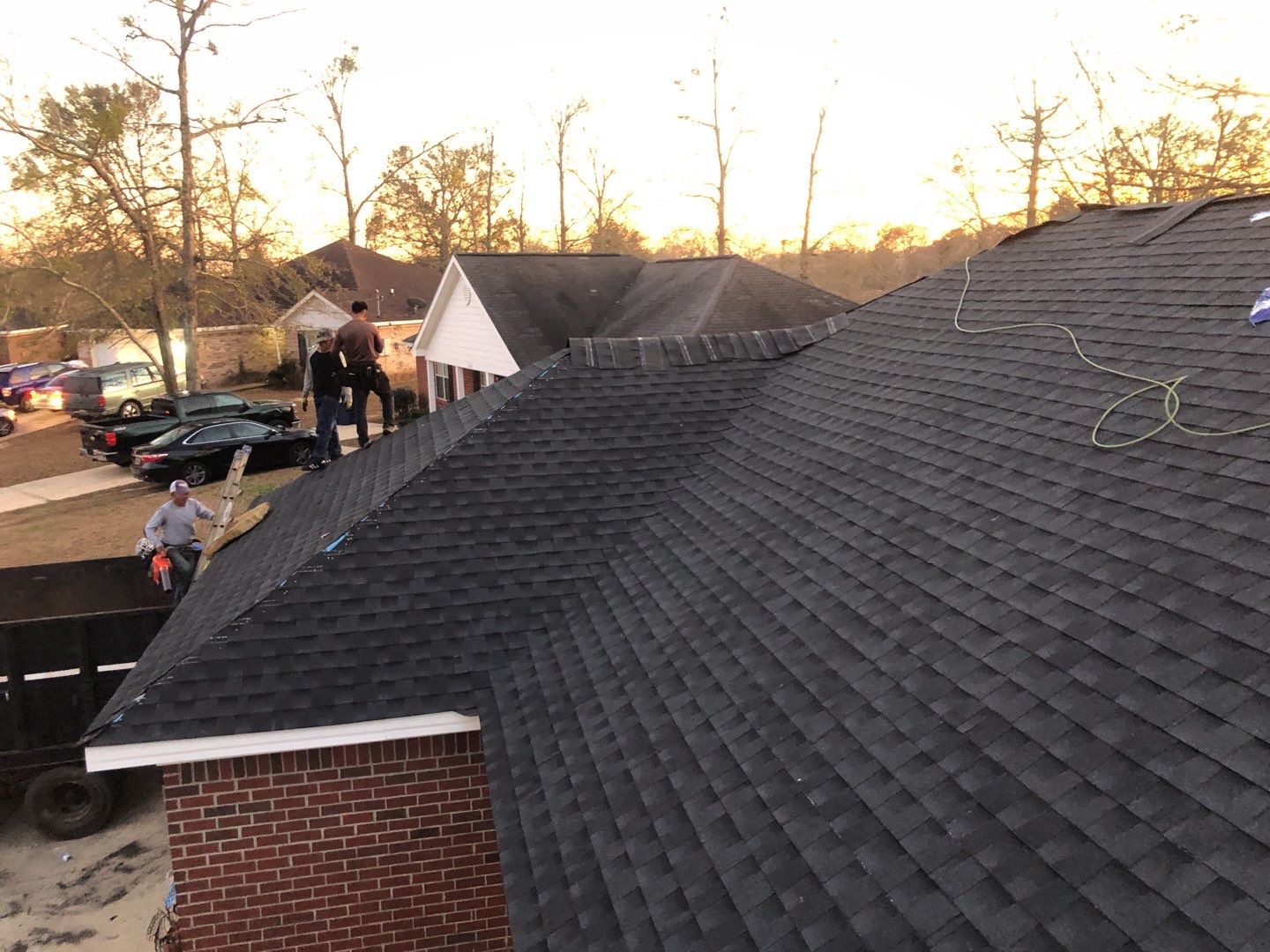 Residential Roofing Installation using Roof Replacement by American Roofing & Construction LLC