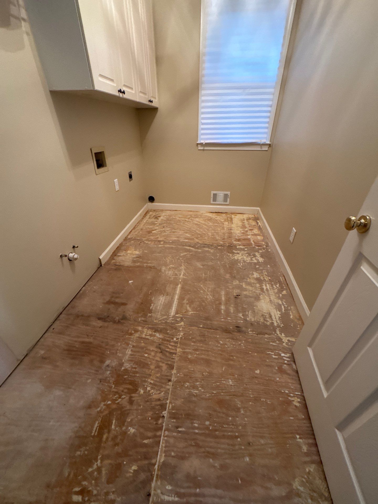 Marietta Bathroom and Laundry Room Floor and Vanity Remodel by Swift Home Renovations